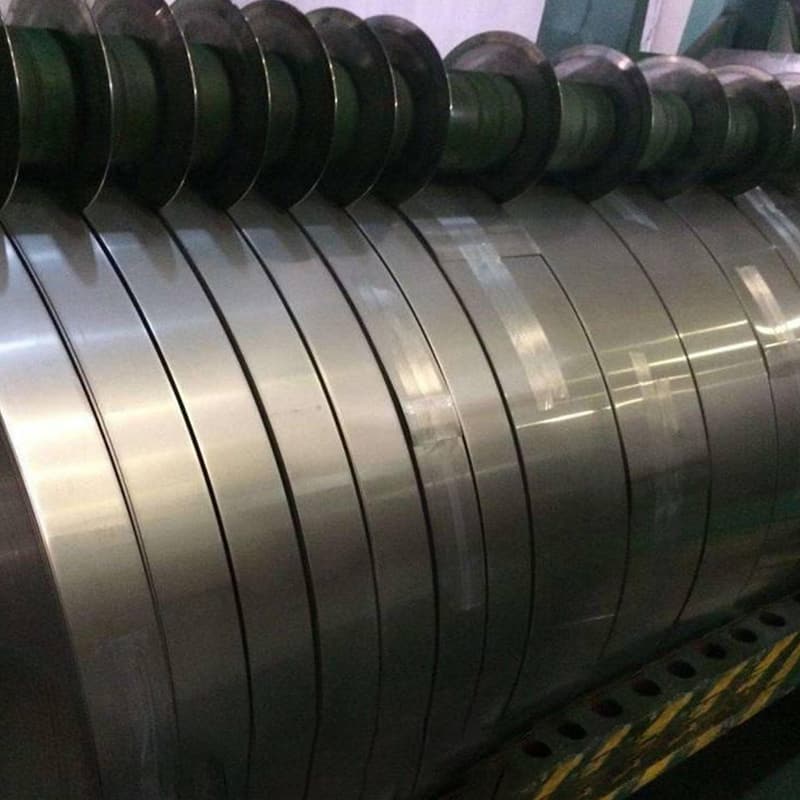 High-precision slitting machine cutting wide 316L stainless steel coil into narrow strips under 0.05mm tolerance High-precision slitting machine cutting wide 316L stainless steel coil into narrow strips under 0.05mm tolerance